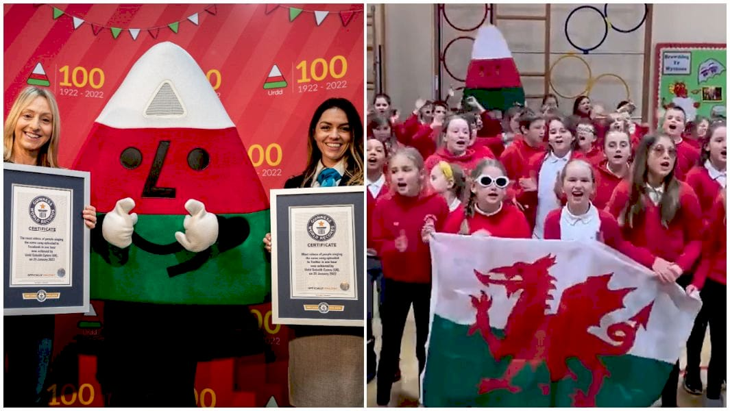 Учасники Urdd Gobaith Cymru виконують гімн на святкуванні 100-річчя