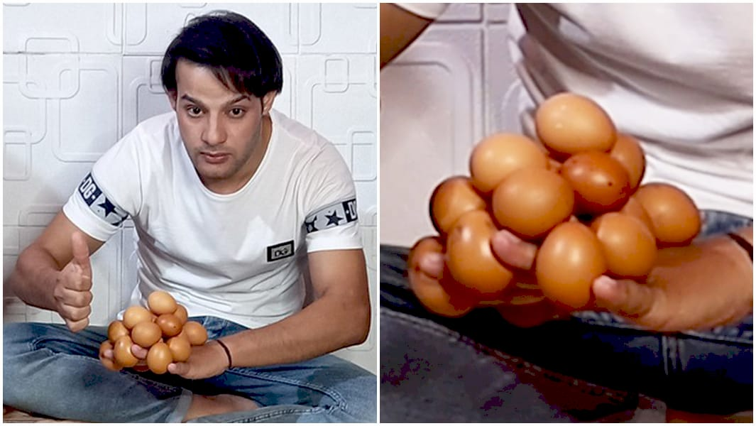 Ібрагім Садек з 18 яйцями на руці